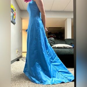 A size 12 prom dress, made and designed by me. It is in very good condition!